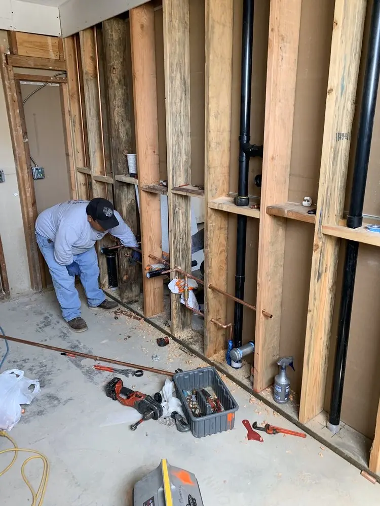 Commercial rough-in plumbing for Water Heater Replacement in Westbury